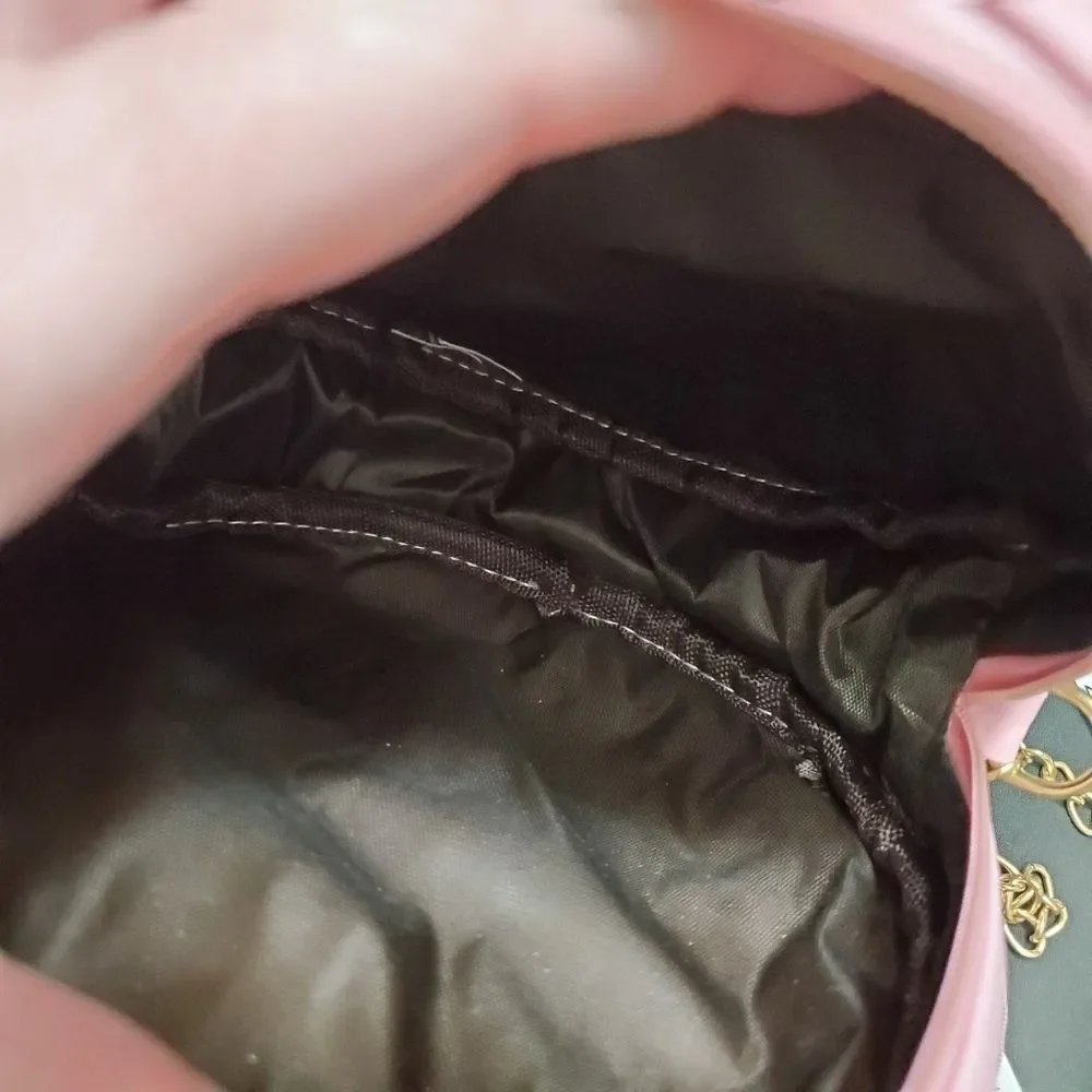 Round pink crossbody with faux pearls